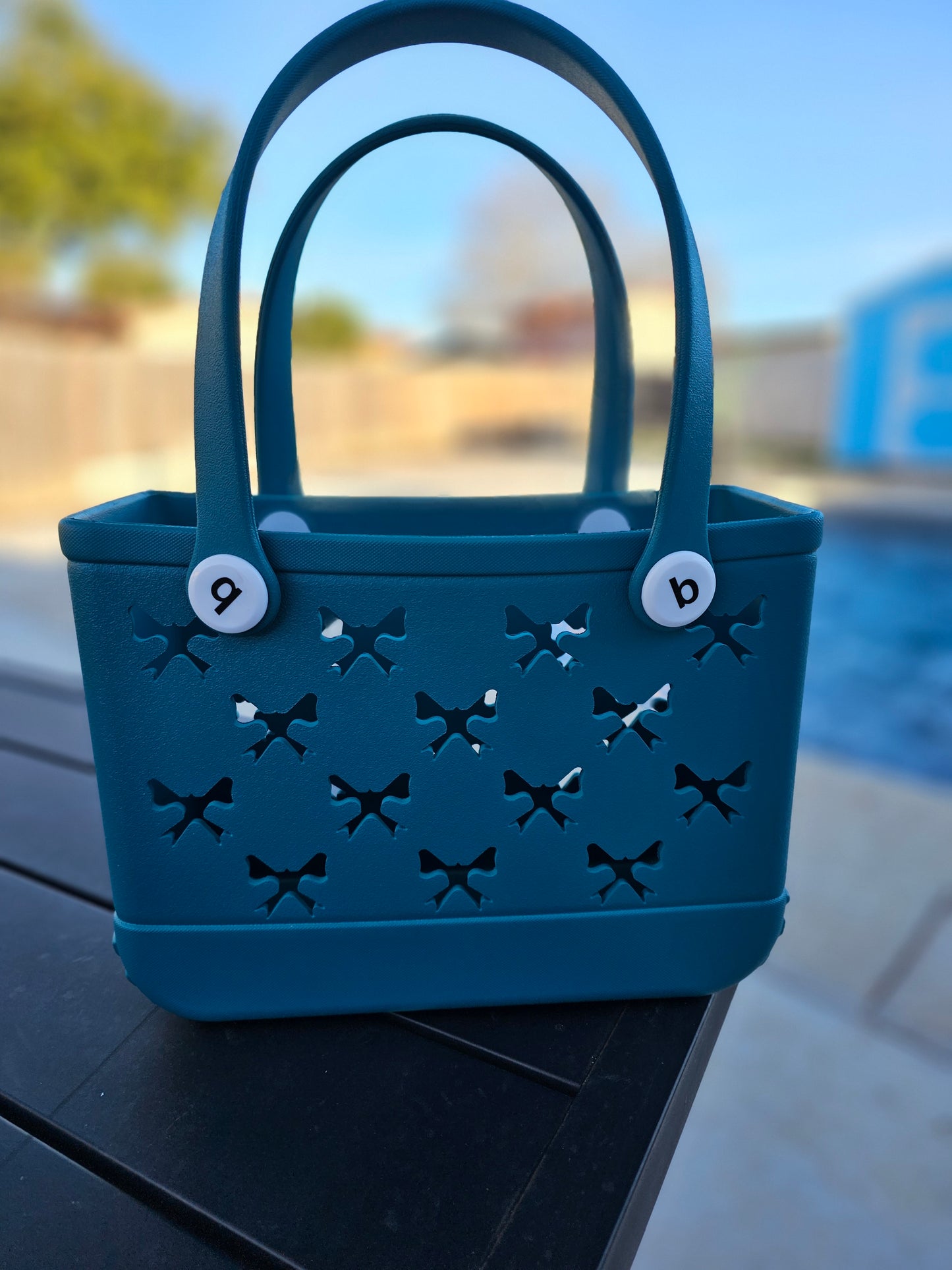 Teal small bogg like bow cut bag(11in.x8in.)
