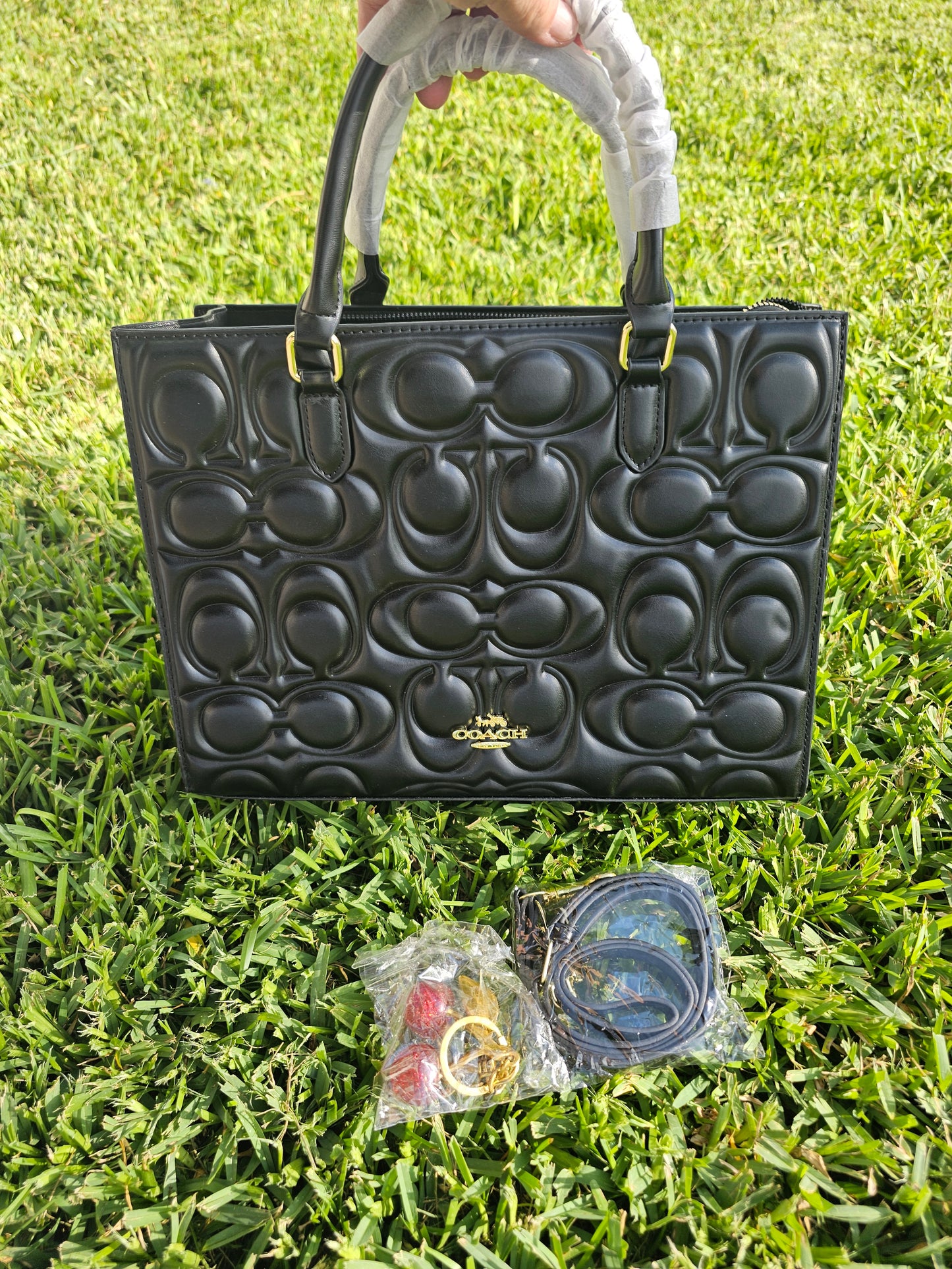 Large hand bag w/charm & strap